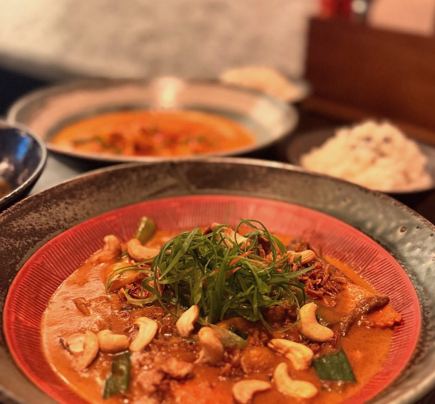 Massaman beef with cashews and fresh herbs